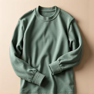 Organic cotton fishing shirt, naturally dyed, neatly folded.